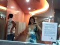 Tranny taking a pee inside the Mens Room!